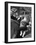 Mother and Baby Wearing Gas Masks During Gas Preparations Test During WWII-Hans Wild-Framed Premium Photographic Print