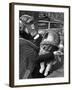 Mother and Baby Wearing Gas Masks During Gas Preparations Test During WWII-Hans Wild-Framed Photographic Print