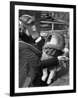 Mother and Baby Wearing Gas Masks During Gas Preparations Test During WWII-Hans Wild-Framed Photographic Print