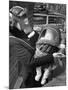 Mother and Baby Wearing Gas Masks During Gas Preparations Test During WWII-Hans Wild-Mounted Photographic Print