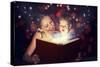 Mother and Child Baby Daughter Reading Magic Book in Dark-evgeny atamanenko-Stretched Canvas