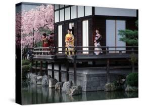 Mother and Daughter at Shobi-Kan Teahouse, Garden at Heian Shrine During Cherry Blossom Festival-Nancy & Steve Ross-Stretched Canvas