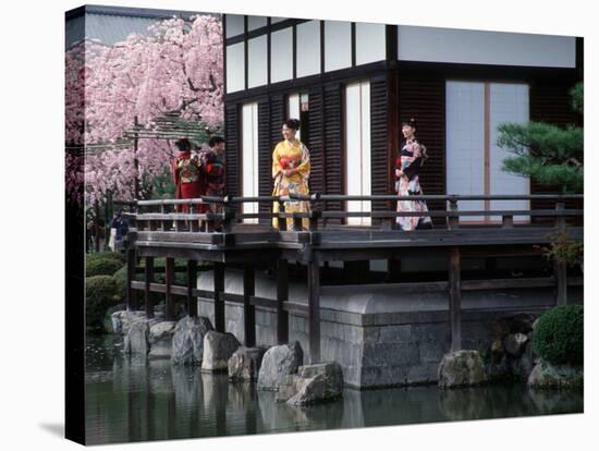 Mother and Daughter at Shobi-Kan Teahouse, Garden at Heian Shrine During Cherry Blossom Festival-Nancy & Steve Ross-Stretched Canvas