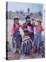 Mother and Four Children Wearing Derby Hats, Playing with Ball of Yarn, Andean Highlands of Bolivia-Bill Ray-Stretched Canvas