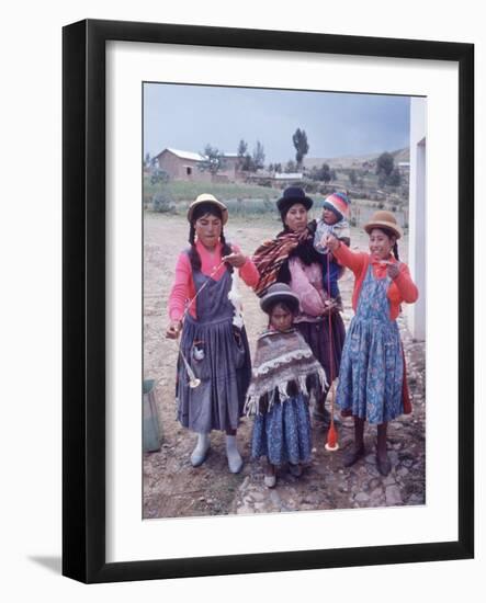 Mother and Four Children Wearing Derby Hats, Playing with Ball of Yarn, Andean Highlands of Bolivia-Bill Ray-Framed Premium Photographic Print