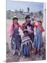 Mother and Four Children Wearing Derby Hats, Playing with Ball of Yarn, Andean Highlands of Bolivia-Bill Ray-Mounted Photographic Print