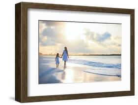 Mother and Her Little Daughter Walking along a Beach on Sunset-BlueOrange Studio-Framed Photographic Print