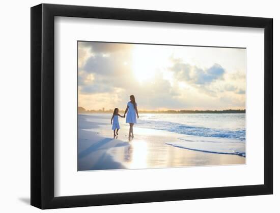 Mother and Her Little Daughter Walking along a Beach on Sunset-BlueOrange Studio-Framed Photographic Print