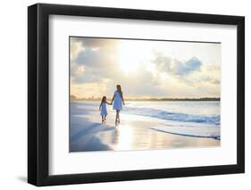 Mother and Her Little Daughter Walking along a Beach on Sunset-BlueOrange Studio-Framed Photographic Print