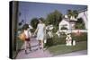 Mother and Son Walking by Christmas Decorations on Yards-William P. Gottlieb-Stretched Canvas