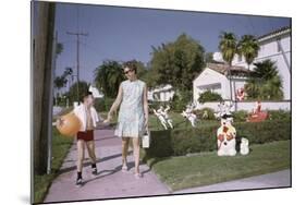 Mother and Son Walking by Christmas Decorations on Yards-William P. Gottlieb-Mounted Photographic Print