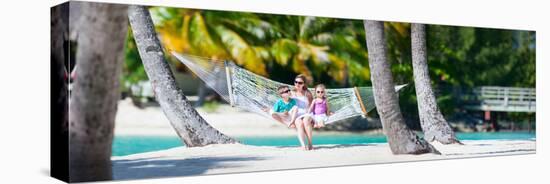 Mother and Two Kids Relaxing on Hammock at Tropical Beach-BlueOrange Studio-Stretched Canvas