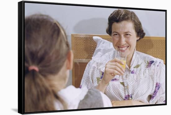 Mother Enjoying Glass of Orange Juice in Bed-William P. Gottlieb-Framed Stretched Canvas