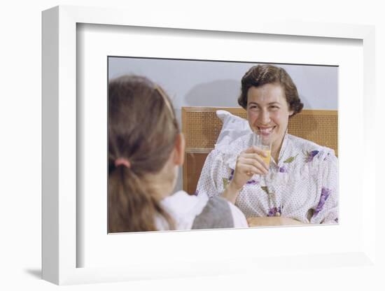 Mother Enjoying Glass of Orange Juice in Bed-William P. Gottlieb-Framed Photographic Print