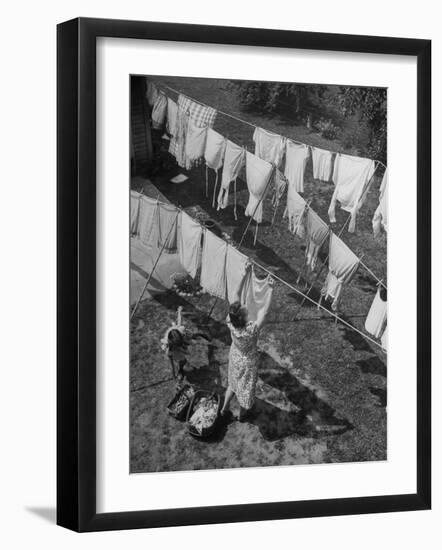 Mother Hanging Laundry Outdoors During Washday-Alfred Eisenstaedt-Framed Premium Photographic Print