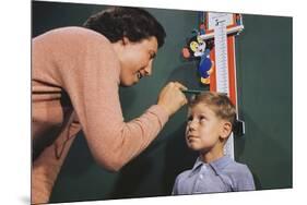 Mother Measuring Boy's Height-William P. Gottlieb-Mounted Photographic Print
