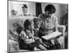 Mother Reading a Story to Her Two Children-null-Mounted Photographic Print