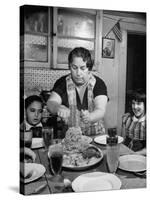 Mother Serving Spaghetti to Her Children-null-Stretched Canvas