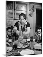 Mother Serving Spaghetti to Her Children-null-Mounted Photographic Print