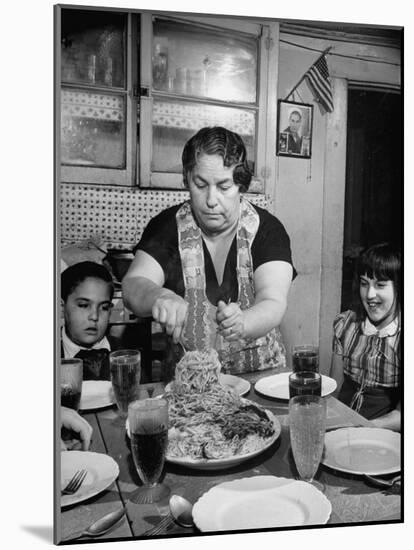 Mother Serving Spaghetti to Her Children-null-Mounted Photographic Print