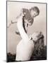 Mother Swinging Daughter up in the Air-Philip Gendreau-Mounted Photographic Print