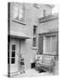 Mother with Her Two Sons in the Courtyard of their German Home, Ca. 1946-null-Stretched Canvas