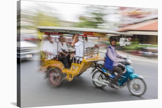 Motion Blur Image of a Tuk-Tuk in the Capital City of Phnom Penh-Michael Nolan-Stretched Canvas