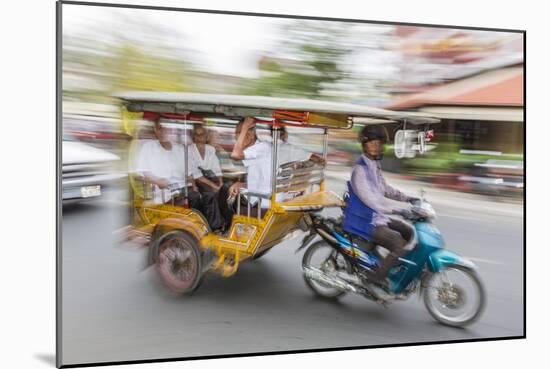 Motion Blur Image of a Tuk-Tuk in the Capital City of Phnom Penh-Michael Nolan-Mounted Photographic Print