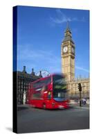 Motion Blurred Red London Bus Below Big Ben-Stuart Black-Stretched Canvas