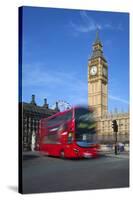 Motion Blurred Red London Bus Below Big Ben-Stuart Black-Stretched Canvas