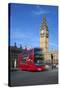 Motion Blurred Red London Bus Below Big Ben-Stuart Black-Stretched Canvas