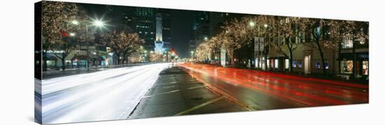 Motion of Cars Along Michigan Avenue Illuminated with Christmas Lights, Chicago, Illinois, USA-null-Stretched Canvas