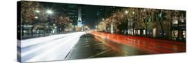 Motion of Cars Along Michigan Avenue Illuminated with Christmas Lights, Chicago, Illinois, USA-null-Stretched Canvas