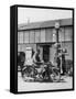 Motor Cycle Rider Stops at a Garage in Scotland for Petrol Sitting-null-Framed Stretched Canvas