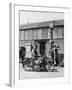 Motor Cycle Rider Stops at a Garage in Scotland for Petrol Sitting-null-Framed Photographic Print