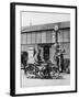 Motor Cycle Rider Stops at a Garage in Scotland for Petrol Sitting-null-Framed Photographic Print