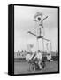 Motorcycle Acrobat Troupe Called "The Promenade Percies" Practise Their Act Involving Balance-null-Framed Stretched Canvas