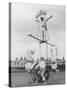 Motorcycle Acrobat Troupe Called "The Promenade Percies" Practise Their Act Involving Balance-null-Stretched Canvas