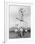 Motorcycle Acrobat Troupe Called "The Promenade Percies" Practise Their Act Involving Balance-null-Framed Photographic Print