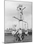 Motorcycle Acrobat Troupe Called "The Promenade Percies" Practise Their Act Involving Balance-null-Mounted Photographic Print