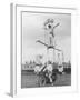 Motorcycle Acrobat Troupe Called "The Promenade Percies" Practise Their Act Involving Balance-null-Framed Photographic Print