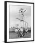 Motorcycle Acrobat Troupe Called "The Promenade Percies" Practise Their Act Involving Balance-null-Framed Photographic Print