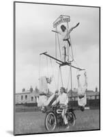 Motorcycle Acrobat Troupe Called "The Promenade Percies" Practise Their Act Involving Balance-null-Mounted Photographic Print