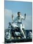 Motorcycle Daredevil Evel Knievel Poised on His Harley Davidson-Ralph Crane-Mounted Premium Photographic Print