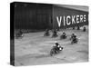 Motorcycles racing at the MCC Members Meeting, Brooklands, 10 September 1938-Bill Brunell-Stretched Canvas