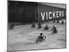 Motorcycles racing at the MCC Members Meeting, Brooklands, 10 September 1938-Bill Brunell-Mounted Photographic Print