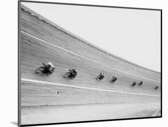 Motorcycles Racing on Sloped Track-null-Mounted Photographic Print