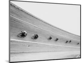 Motorcycles Racing on Sloped Track-null-Mounted Photographic Print