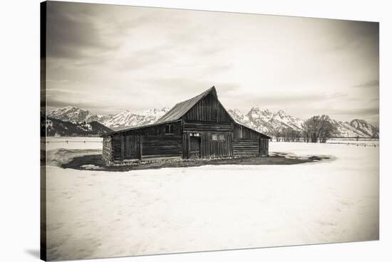 Moulton Barn and Tetons in winter, Grand Teton National Park, Wyoming, USA-Russ Bishop-Stretched Canvas