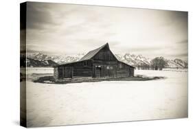 Moulton Barn and Tetons in winter, Grand Teton National Park, Wyoming, USA-Russ Bishop-Stretched Canvas